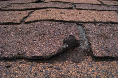 Curling shingles