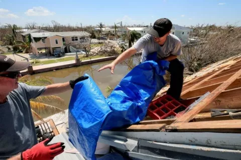 Tarp on shingle roof