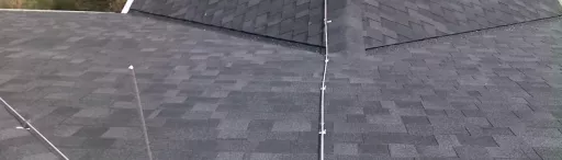Lightning protection system installed on shingle roof