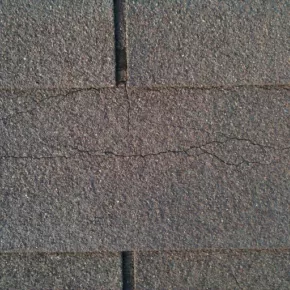Cracked shingles on roof